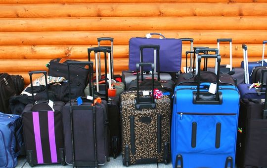 Checked versus carry-on luggage