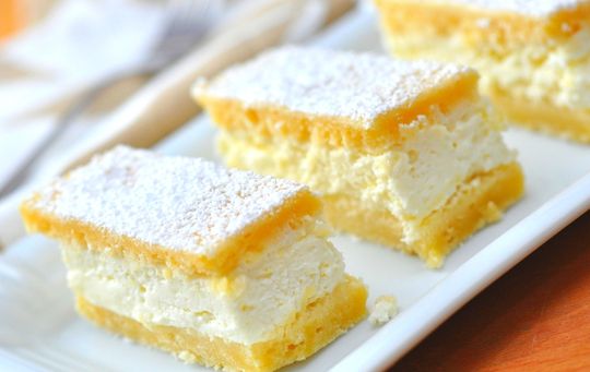 Why do some cheesecake recipes call for sour cream